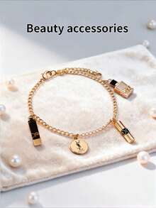 Yves Saint Laurent 女士金色吊坠手链，双G标志交织吊坠，简约优雅，甜美时尚，情人节、生日、周年纪念日及日常佩戴的完美礼物 - 金色 - 查看 1