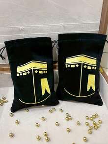 1个黑色礼品袋，饰有金色灯笼图案 - 适用于朝圣、灯笼、星星和伊斯兰节日。设计有拉环、灯笼形状、精美图案和耐用绳索。 - 黑色 - 查看 3