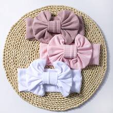 全新欧美风宠物配饰：条纹领结狗狗头带，可作狗狗毛发装饰或颈部装饰。采用涤纶和氨纶混纺面料，高弹力，可水洗，适合大型犬日常佩戴。弹性十足，佩戴舒适，四季皆宜。 - 彩色 - 查看 4