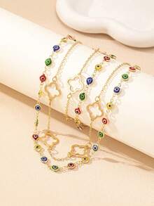 2件套时尚简约金属镂空四叶草和邪眼吊坠项链手链套装，适合少女日常、派对、节日佩戴