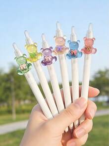 色彩鲜艳、可爱小熊图案的凝胶笔，黑色笔尖，0.5毫米笔尖，适用于笔记本、书写、做作业、工作、办公室、医院、护士、医生、记笔记、备忘录、文具、学校、学生、教师、返校用品，适合赠送朋友、家人、孩子、同学，也是返校季、圣诞节、生日、节日礼物的理想之选。 - 黑色 - 查看 12