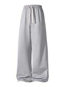 男士宽松休闲纯色阔腿裤，带抽绳腰带和大口袋，适合日常行走、工作、旅行和其他场合。