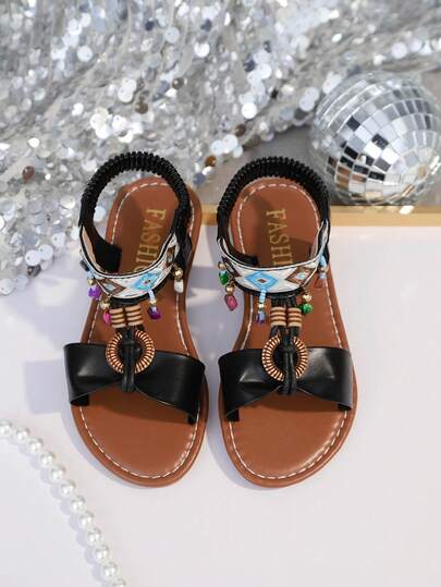 1双儿童波西米亚风套脚弹力带PU防滑耐穿可爱休闲平底鞋，适合送礼、上学、海滩、露营、春季郊游，2026新款