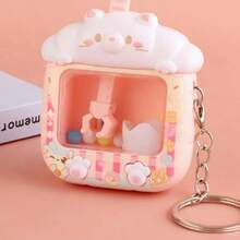 1 pieza Llavero mini máquina de garra para adolescentes, juguete antiestrés de animal de dibujos animados lindo, juego interactivo portátil para aliviar el estrés, amuleto divertido para bolso y regalo novedoso - Multicolor - Ver 7