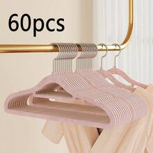 1/5/10/20/60/100个装防滑隐形衣物保护套，超薄节省空间设计，适用于衬衫、裤子、连衣裙等各种衣物，是居家衣橱、零售展示衣架的必备之选。纤薄设计，简约收纳架，坚固耐用的塑料衣架，多功能衣架，家居收纳，时尚精品店适用。