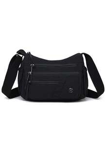 休闲尼龙面料单肩包，配有可调节肩带、多隔层、纯色、拉链封口和涤纶衬里，轻便易携，适合日常斜挎。 - 黑色 - 查看 7