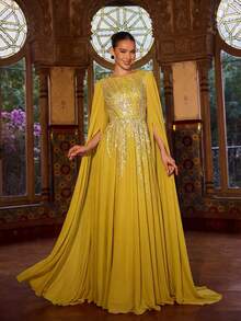 Faeriesty 这款优雅的阿巴雅长袍饰有珍珠，配以亮片雪纺袖，搭配飘逸的A字连衣裙，是婚礼、盛大晚宴、颁奖典礼和红毯活动的理想之选，尤其适合春季派对。 - 黃色 - 查看 1