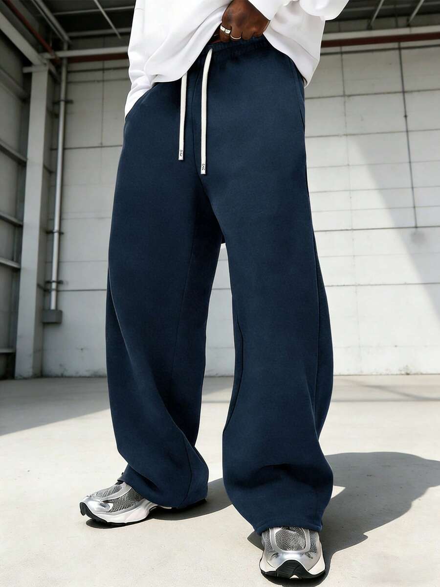 Men's Solid Color Drawstring Pocket Casual Sports Pants Loose Black Loose Fit Long Pants - Navy Blue - View 1