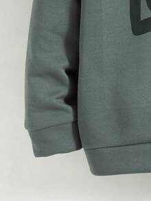 Bộ 2 món cho bé trai tuổi teen, gồm áo hoodie và quần dài in chữ, kiểu dáng thường ngày, có lớp lót giữ nhiệt, thích hợp cho mùa thu/đông. - Màu xám đen - Xem 5