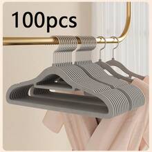 1/5/10/20/60/100个装防滑隐形衣物保护套，超薄节省空间设计，适用于衬衫、裤子、连衣裙等各种衣物，是居家衣橱、零售展示衣架的必备之选。纤薄设计，简约收纳架，坚固耐用的塑料衣架，多功能衣架，家居收纳，时尚精品店适用。