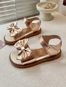 一双可爱的女童平底凉鞋，鞋底柔软，饰有蝴蝶结，适合玩耍和日常穿着。 - 玫瑰金 - 查看 5