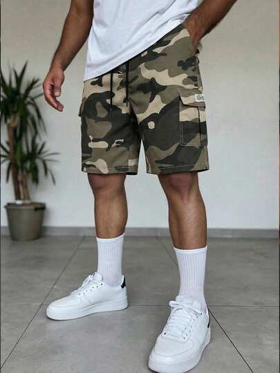男士休闲迷彩短裤，时尚百搭，适合日常通勤和夏季穿着