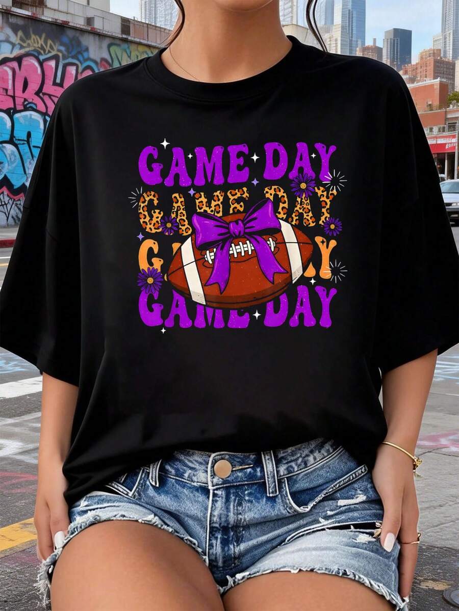 Camiseta de temporada de touchdown con lazo de fútbol del día de juego de leopardo púrpura 2026, nuevas camisetas impresas para mujeres, estilos populares, camisetas de primavera para mujeres, camisetas de invierno, camisetas de para mujeresás vendidas - Negro - Ver 1