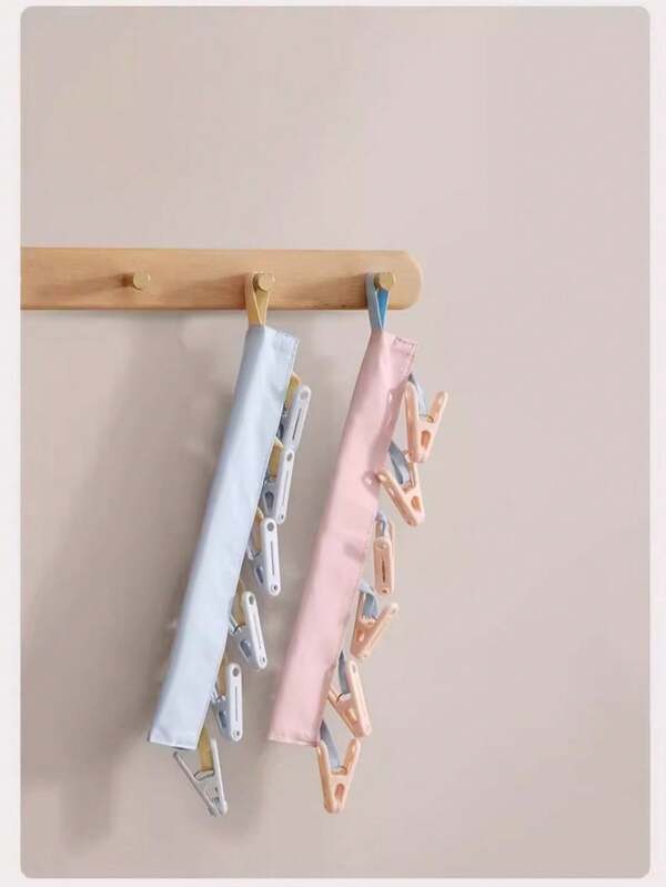 1PC Portable Foldable Clothes Hanger With 6 Clips - Space-Saving Drying Rack For Socks, Underwear & Delicates, Durable Plastic Material, Travel-Friendly Folding Hanger Set, Compact Collapsible Clip Hanger Organizer For Home, Apartment, Dorm, RV, Camping, Beach, Gym & Business Trip, Quick-Dry Breathable Design For Small Loads, Must-Have Travel Laundry Accessory & Ideal Gift, Easy To Hang & Store