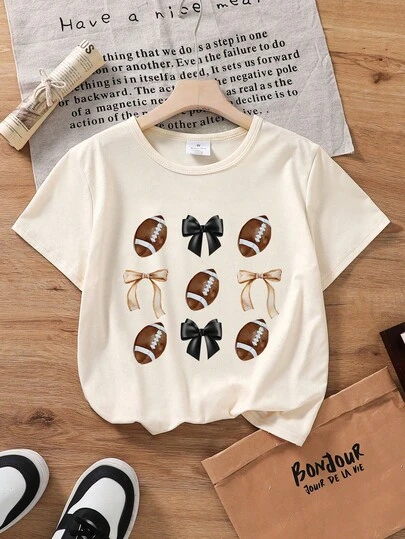 女孩蝴蝶结爱好者T恤，足球图案印花短袖上衣，适合活泼好动的女孩，夏季款