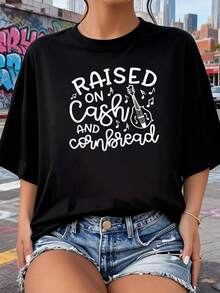 Camiseta linda y divertida deúsica country Raised On Cash and Cornbread 2026, nuevas camisetas impresas para mujeres, estilos populares, camisetas de primavera para mujeres, camisetas de invierno, camisetas de para mujeresás vendidas - Negro - Ver 1