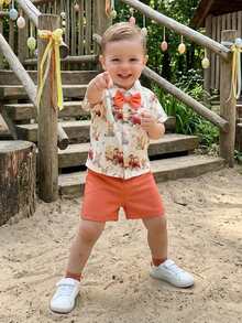 Conjunto de 2 piezas de Pascua para niños, con estampado de huevos de conejito de verano, top de manga corta con cuello vuelto y pantalones cortos - Naranja - Ver 2