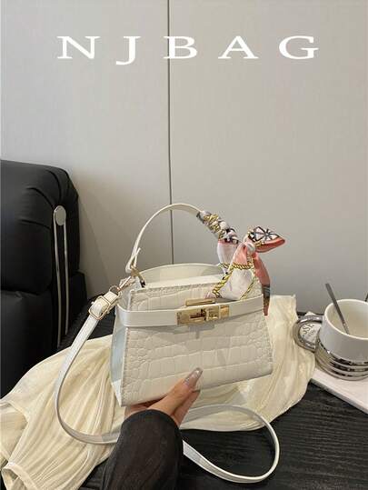 这款迷你时尚多功能休闲手提包专为女性设计，采用时尚高端鳄鱼纹图案，配有可调节肩带、装饰丝巾和磁扣，是一款轻便多功能斜挎包。简约纯色设计，经久耐用的PU材质，适合作为礼物送给朋友，也适合购物、约会、商务旅行、旅游和度假等场合。