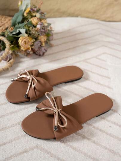 1双女士纯色蝴蝶结仿皮防滑平底凉鞋，简约风格，适合日常穿着、海滩度假和夏季穿着