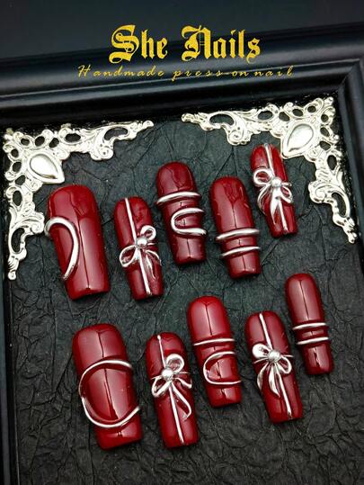 10pcs Glamorous Baroque Valentine's Day Y2K Shiny Acrylic Nail Tips, Handmade Red Shiny Rectangular Nails, 3D Handmade Silver Bow, Silver Waves And Round French Manicure, Sexy Metallic Finish, Suitable For New Year, Valentine's Day Or Parties, Suitable For Women, Includes Gel Stickers And Nail File. Nail Supplies