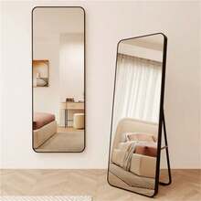 Pełnowymiarowe lustro o wymiarach 45 x 155 cm, w kolorze czarnym, z zaokrąglonymi krawędziami, wykonane z odpornego na stłuczenie szkła float, ze stabilną metalową podstawą i plastikową ramą, można postawić na podłodze lub zamontować na ścianie, lekkie i zapakowane w nowoczesne opakowanie. - Czarne - Zobacz 1