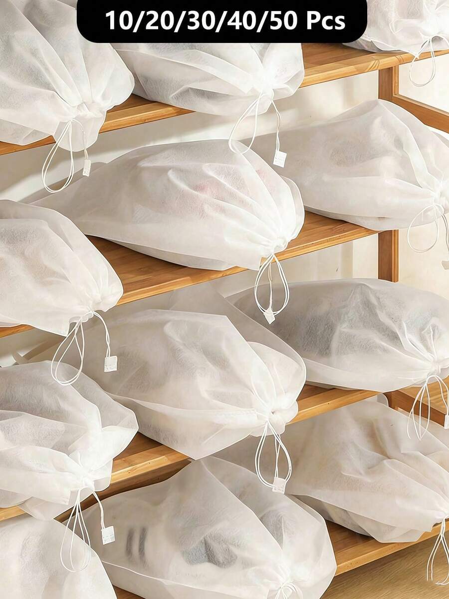 Bộ 10/15 túi đựng giày xách tay bán trong suốt, túi đựng giày bằng vải không dệt thoáng khí, túi cầm tay chống bụi, túi dây rút nhẹ để đựng giày và túi xách, cách ly bụi, giữ cho giày và túi xách sạch sẽ và gọn gàng, đóng gói tiện lợi, chống thấm nước, di động, thiết kế treo, thích hợp cho du lịch tàu biển và kỳ nghỉ. Túi đựng giày dây rút du lịch, túi bọc giày cho nam nữ, túi đựng đồ du lịch cần thiết cho kỳ nghỉ. - trắng - Xem 1