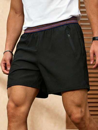 男士夏季休闲拼接撞色短裤，透气时尚，适合日常穿着、度假和运动。