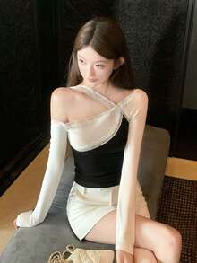 韩版性感撞色蕾丝斜肩长袖T恤，修身收腰设计，显瘦显瘦，春季款 - 黑白拼接 - 查看 3