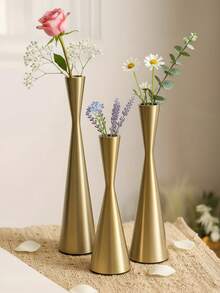 1件/套 纤腰流线型花瓶。整个花瓶采用金属质感材质制成。其造型采用“腰部纤细，顶部和底部加宽”的流线型设计，线条简洁流畅，偏向现代轻奢风格。适合摆放在客厅茶几等家居空间。 - 彩色 - 查看 4