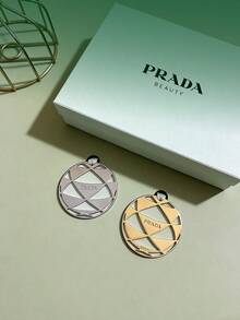 Prada Gold & Silver Hollow Circle Pendant Letter Ribbon Bag Charm, Fashion Commuter Bag Accessory, Exquisite Keychain, Elegant Gift Box Set - Silver - View 3