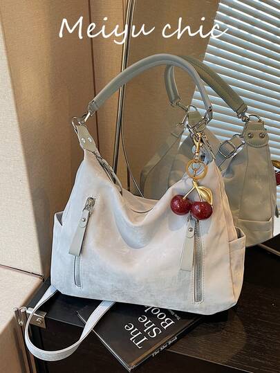 この洗練されたショルダーバッグは、PU素材を使用したマルチジッパーデザインが特徴です。学生、旅行者、ビジネスパーソン、通勤者、ショッパー、オフィスワーカー、デート、アウトドアアクティビティなどに最適です。