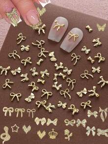 [50 Stück/100 Stück] Y2K Gold Schleife Nagel Schmuck, Gold Metall Schleife Nail Art Dekorationen, Luxus Nagel Accessoires, DIY Nagel Dekoration, geeignet für Frauen und Mädchen Nägel - Gold - Übersicht 1