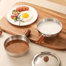 1个高导热不锈钢迷你锅，采用现代金属（金/银）风格，圆形锅身搭配符合人体工学的木质手柄。非常适合单人份餐食，例如炒菜、煎蛋或炖少量汤。 - 彩色 - 查看 3