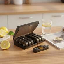 7 天药盒 - 每日两次（早晚），单侧大开口方便取用，黑色隐私保护药盒，适合存放药品、维生素、鱼油、补充剂等。 - 彩色 - 查看 8