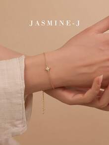 这款S925纯银八角星链手链，镶嵌锆石，简约优雅，尽显高端气质，适合女性日常佩戴。它将是送给她的完美礼物。 - 彩色 - 查看 7