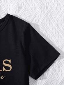 Bộ 2 món cho bé gái, gồm áo tay ngắn cổ tròn in họa tiết da báo và chân váy xếp ly cạp chun, thích hợp cho mùa hè. - màu đen - Xem 3