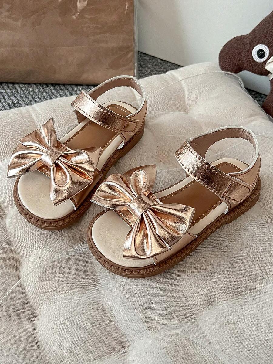 A Pair Of Cute Girls' Flat Sandals With Soft Soles - Featuring A Bow Design, Suitable For Both Playtime And Daily Use - Rose Gold - View 1