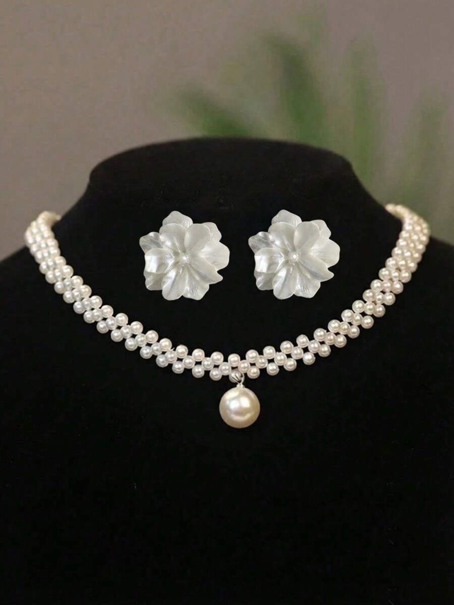 This Minimalist And Fashionable Faux Pearl Woven Necklace, Paired With A Set Of White Floral Earrings, Exudes A Vintage Elegant And Sweet Vibe. It Is A Niche, Luxurious, High-End Jewelry Set Design, Suitable For Ladies To Wear At Weddings, Banquets, Parties And Daily Occasions, As Well As For Wearing On Holidays And Other Special Events. - White - View 1
