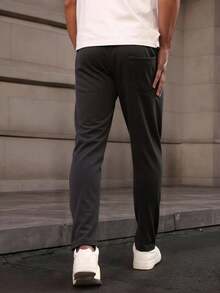 休闲纯色长裤，男士健身运动服，可调节抽绳腰带，适合所有季节，是健身、运动、户外活动的理想礼物 - 黑色 - 查看 8