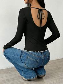 [Backless Lace-Up Design, Contrast Ruffle Cuffs] Fitted Long Sleeve Round Neck Top, Made Of Ribbed Knit Fabric, Solid Black. Perfectly Blends Sweet And Edgy Styles, Suitable For Spring/Autumn Dates, Shopping, Parties, And Everyday Wear. - Black - View 7