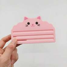 1/2个装猫粮挤压器 - 高效挤压袋内猫粮，最大限度保留剩余量，确保不浪费。专为注重清洁喂食和操作便捷的猫主人设计。这款挤压器适用于各种猫粮袋，易于清洁，保持卫生。