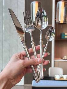 4/16/24件套不锈钢餐具套装，包括餐刀、餐叉、餐勺和咖啡勺，适用于餐厅、酒店、自助餐厅和学校。 - 銀色 - 查看 1