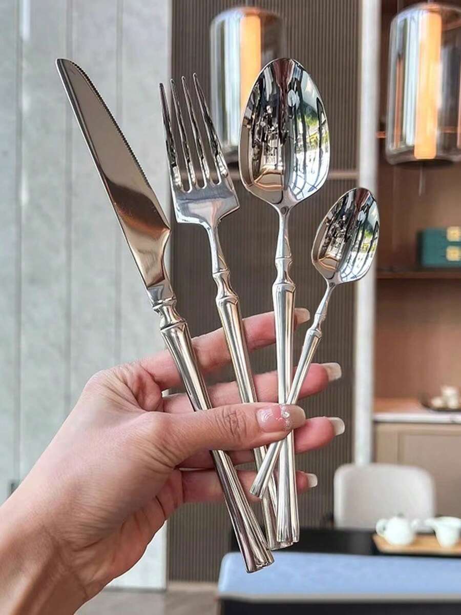 4/16/24件套不锈钢餐具套装，包括餐刀、餐叉、餐勺和咖啡勺，适用于餐厅、酒店、自助餐厅和学校。 - 銀色 - 查看 1