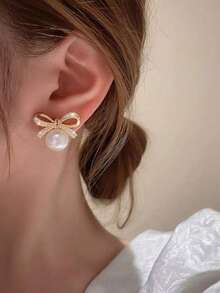 1 Đôi bông tai đính nơ kiểu Pháp cổ điển sang trọng, thích hợp cho các bạn gái tuổi teen, dịp Lễ Tình nhân, đeo hàng ngày và các lễ hội. - Cây cung - Xem 2