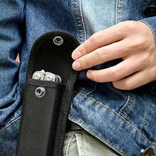 1个黑色刀鞘折叠刀钳包，带尼龙腰带环口袋，可携带收纳，带手电筒支架，可作腰包使用。 - 彩色 - 查看 2