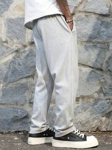 1 chiếc quần dài ống đứng nam, kiểu dáng thường ngày, có dây rút ở eo và túi bên hông, phù hợp cho các hoạt động giải trí, cắm trại, công sở, tiệc tùng và các dịp khác. - Màu Xám nhạt - Xem 2