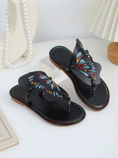 1双女童夏季时尚拖鞋，彩色蝴蝶翅膀设计，拼接工艺，百搭黑色，沙滩人字拖，适合日常穿着、沙滩派对