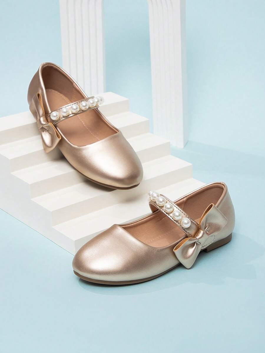 2026 Nuevos zapatos planos elegantes y sencillos de unicolor con lazo de perlas para niñas, primavera - Dorado - Ver 1