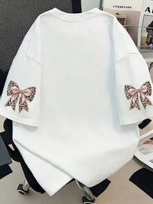 大码女式休闲豹纹蝴蝶结装饰圆领T恤，适合日常穿着、外出、度假、海滩、派对、上学、音乐节、旅行、通勤等场合。时尚短袖，袖子印花。适合夏季度假、海滩、春季、嘉年华等场合。白色 - 白色 - 查看 2