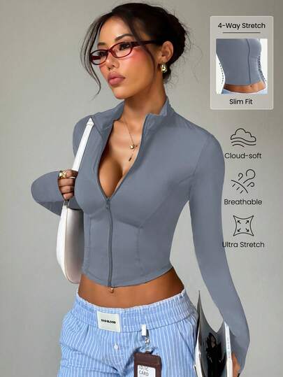 Chaqueta deportiva de mujer de unicolor, con cuello alto, cremallera, manga larga y ojal para el pulgar, de estilo minimalista y de moda para primavera